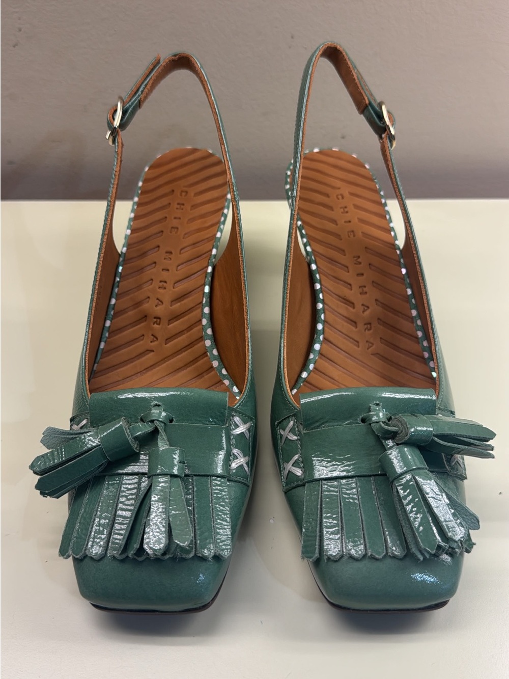 Chie Mihara Teal Patent Leather Slingback Pumps with Tassel Fringe